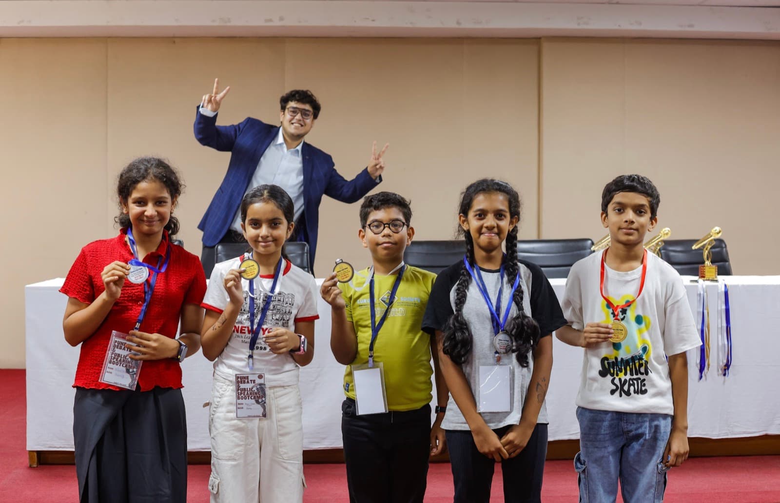 Young students wearing medals